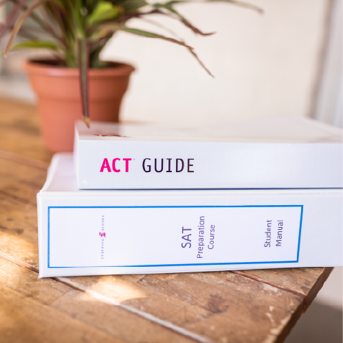 Binders with ACT and SAT test preparation materials